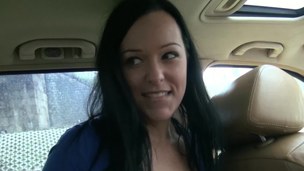 Great blowjob done by a dark-haired babe to her man in his car